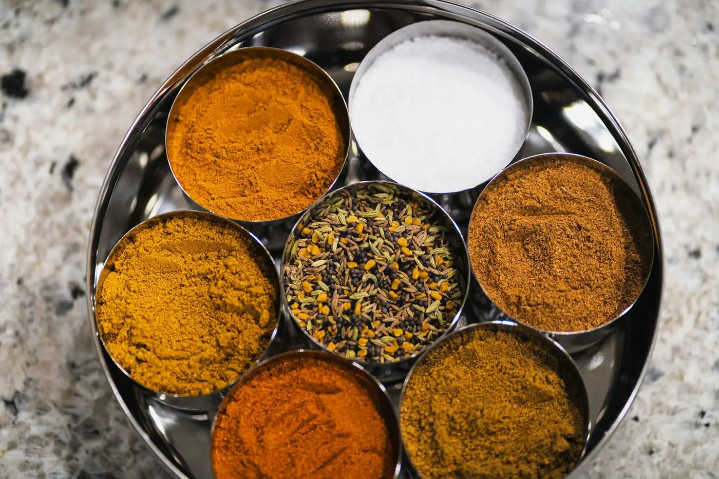 Aromatic botanical ingredients — sandalwood, resins and spices used in traditional Bangalore masala incense manufacturing