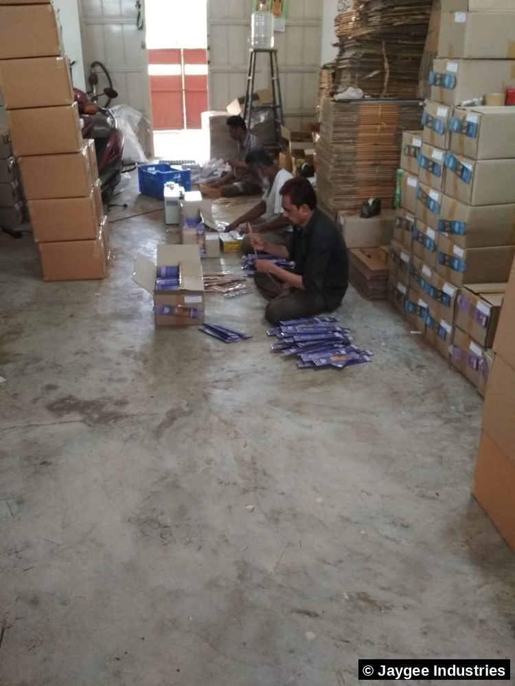 Jaygee Industries warehouse team hand-packing incense products for client orders