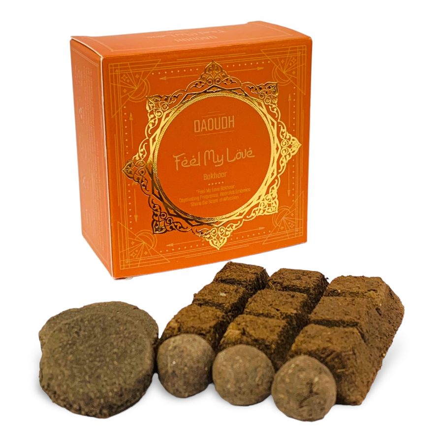 Daoudh Feel My Love Bakhoor — warm orange box with gold medallion