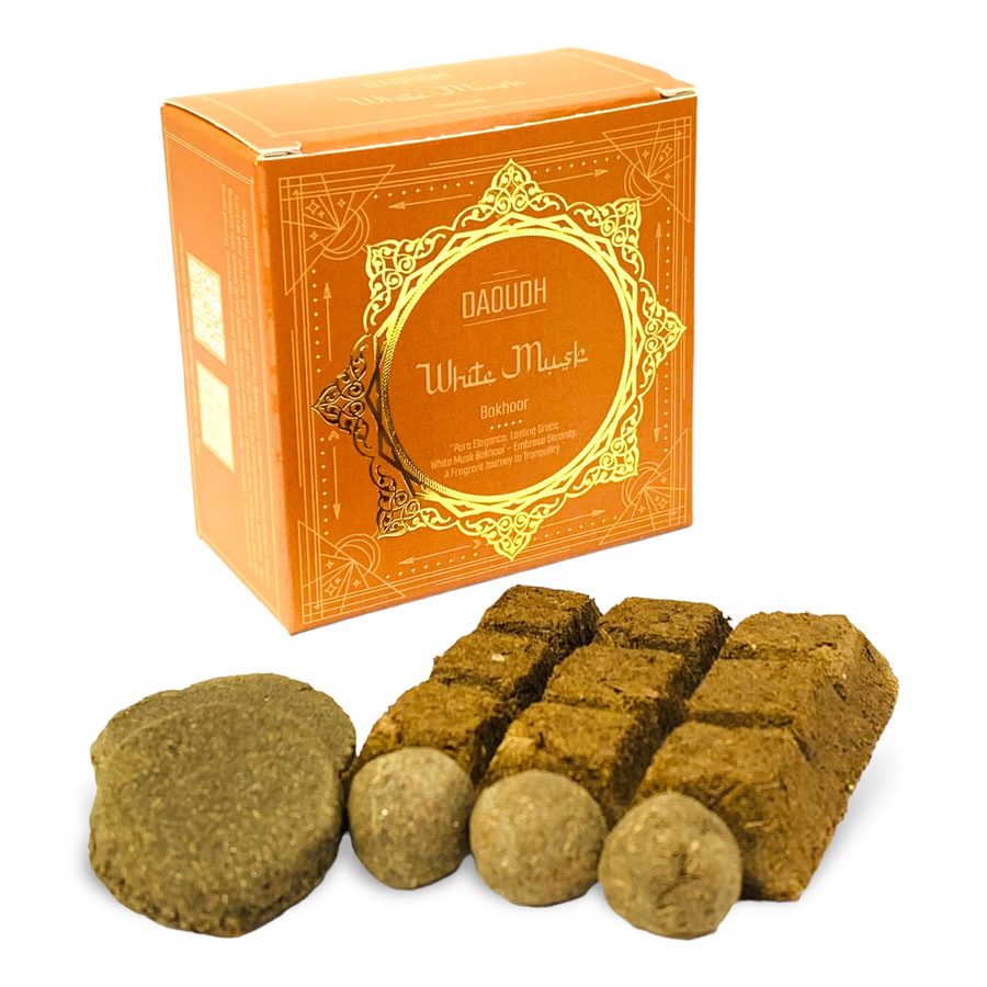 Daoudh White Musk Bakhoor — warm orange box with gold filigree