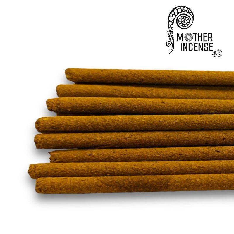 Mother Incense masala sticks close-up — golden natural hue from turmeric and herb ingredients