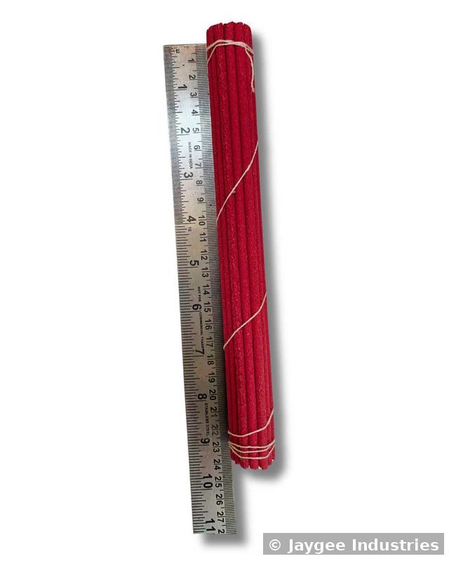 Tibetan incense sticks approximately 27cm in length shown alongside a ruler